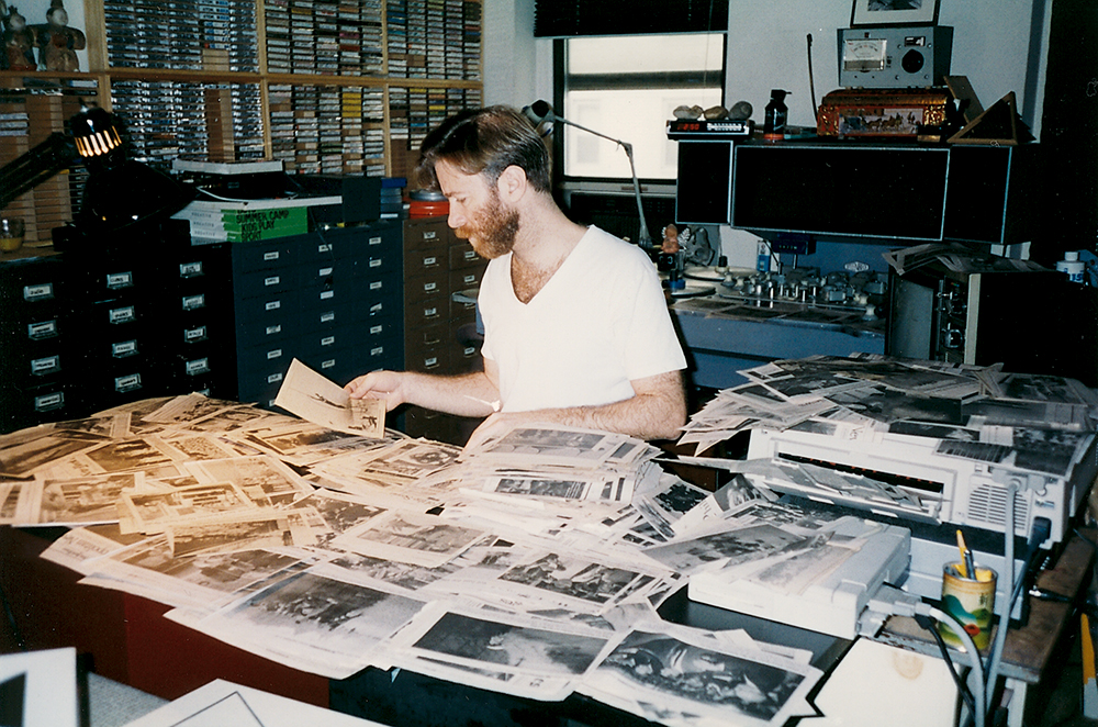 Alan sorting photos