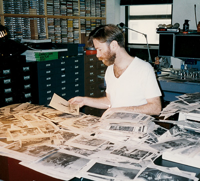 Sorting-Photos-At-Desk-thmb1